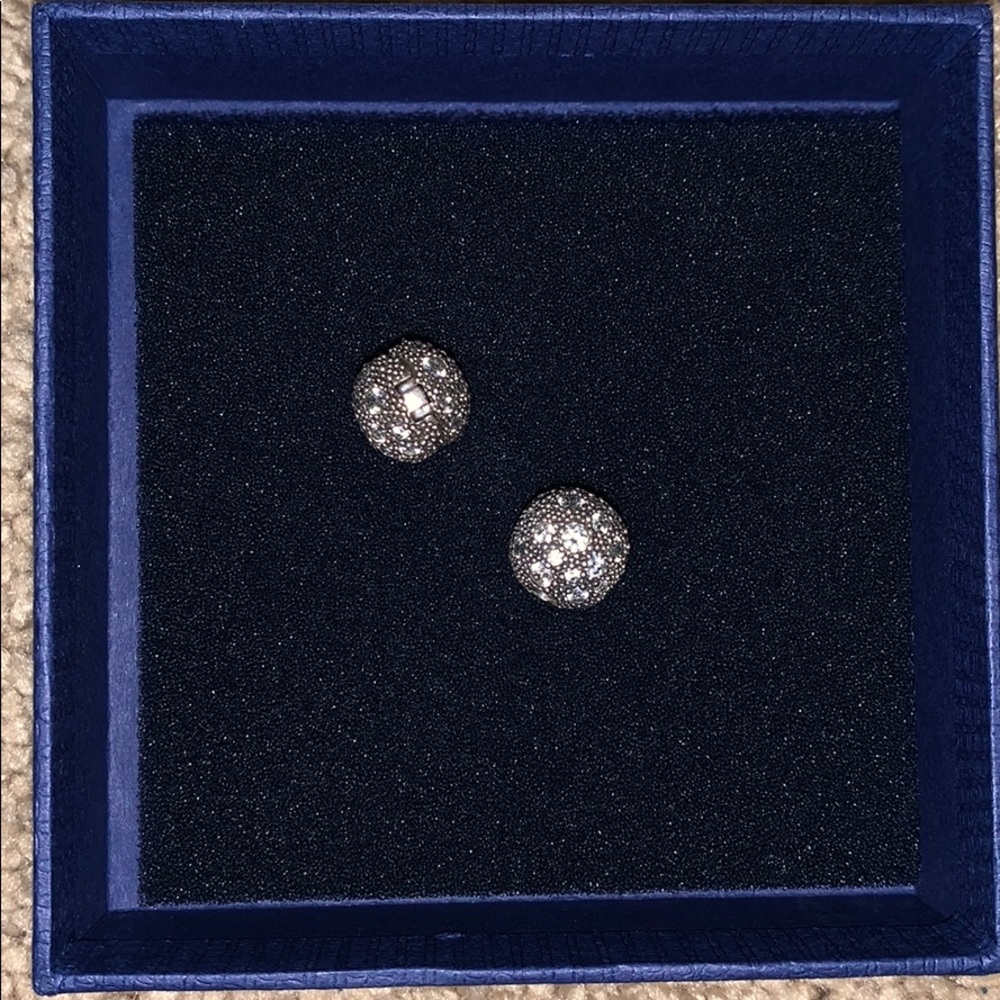 Two pandora charm bracelet clips